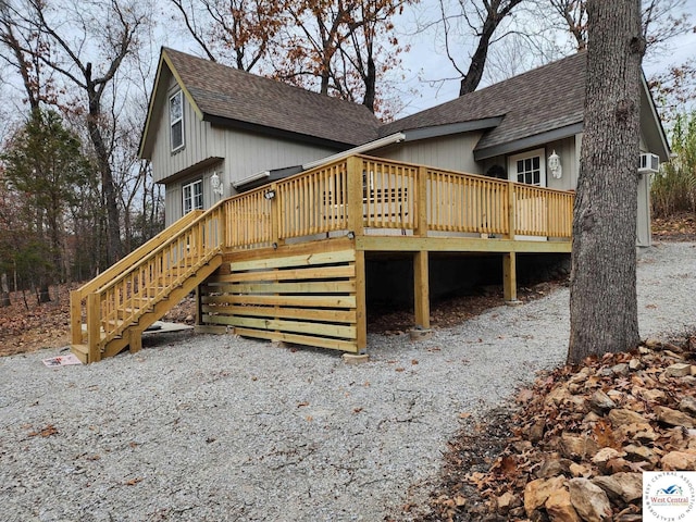 10075 Otter Rd, Clinton, MO 64735 - back of house featuring a shingled roof, stairs, and a wooden deck