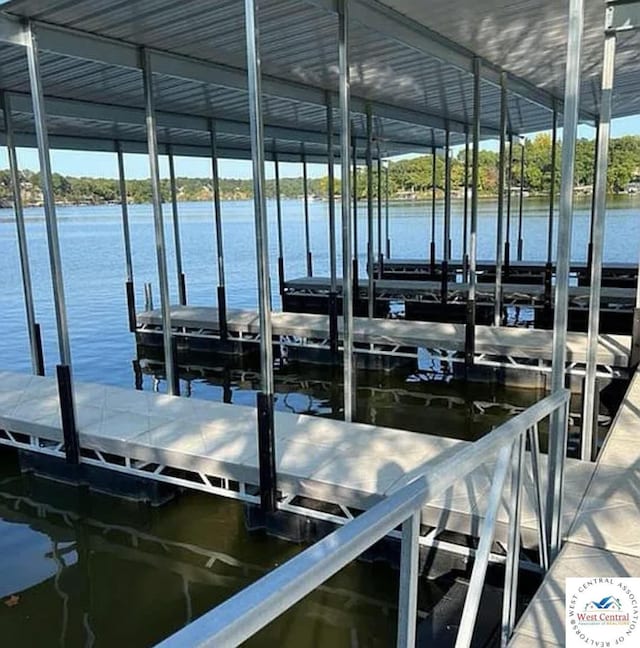 29790 Bobcat Dr, Warsaw, MO 65355 - dock with boat lift and a water view