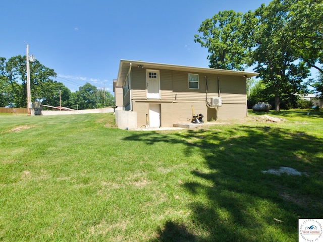 29790 Bobcat Dr, Warsaw, MO 65355 - rear view of house with a lawn