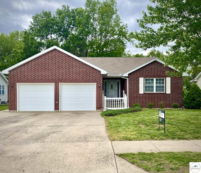 ranch-style house featuring brick siding, a garage, a porch, a front yard, and concrete driveway