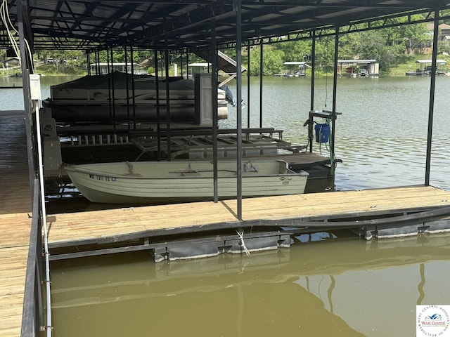 19094 Kennedy Rd, Warsaw, MO 65355 - dock featuring a water view and boat lift