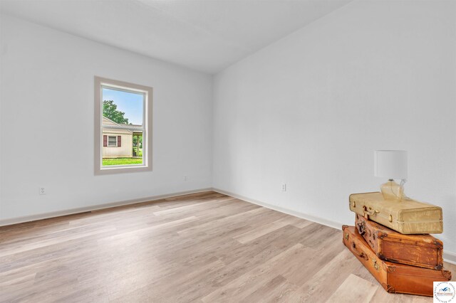 1803 S Quincy Ave, Sedalia, MO 65301 - empty room with light wood-style flooring and baseboards