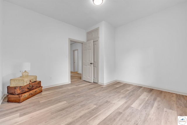 1803 S Quincy Ave, Sedalia, MO 65301 - unfurnished room with light wood-style floors and baseboards