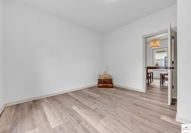 1803 S Quincy Ave, Sedalia, MO 65301 - empty room with light wood-type flooring and baseboards