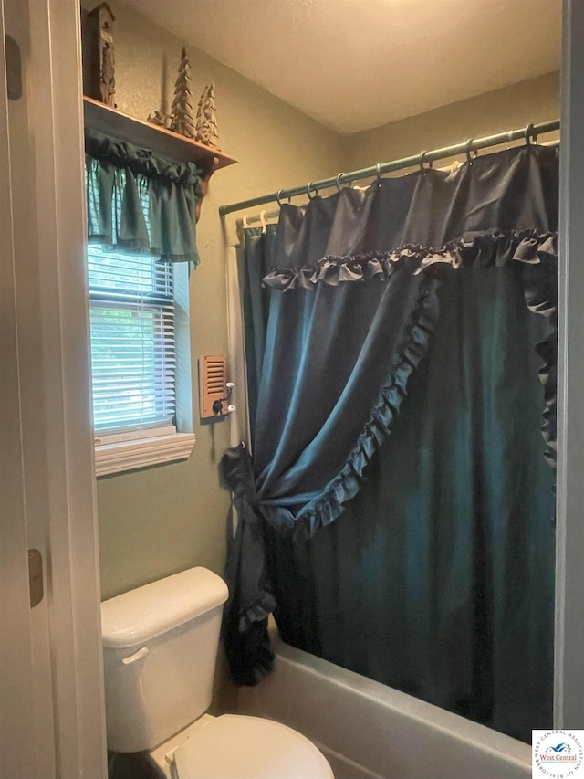 791 SE 1211th Rd, Deepwater, MO 64740 - bathroom with shower / bathtub combination with curtain and toilet