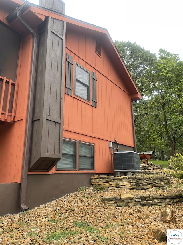 791 SE 1211th Rd, Deepwater, MO 64740 - view of side of home with a cooling unit and a chimney