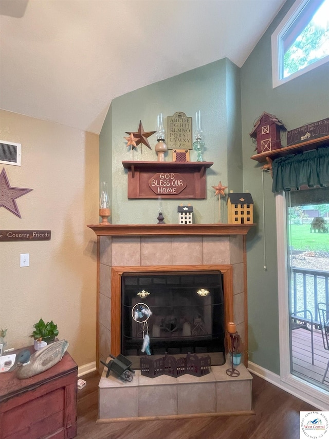 791 SE 1211th Rd, Deepwater, MO 64740 - detailed view of wood finished floors and a tile fireplace