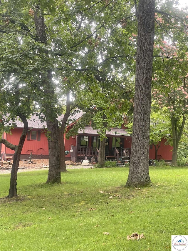 791 SE 1211th Rd, Deepwater, MO 64740 - view of green lawn with covered porch