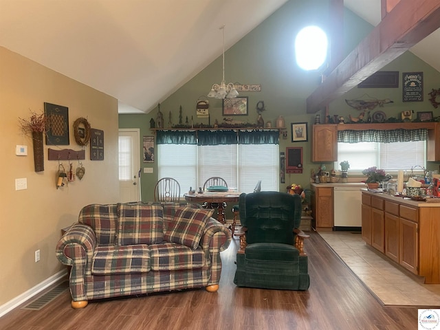 791 SE 1211th Rd, Deepwater, MO 64740 - living room featuring a chandelier, light wood-style floors, and high vaulted ceiling