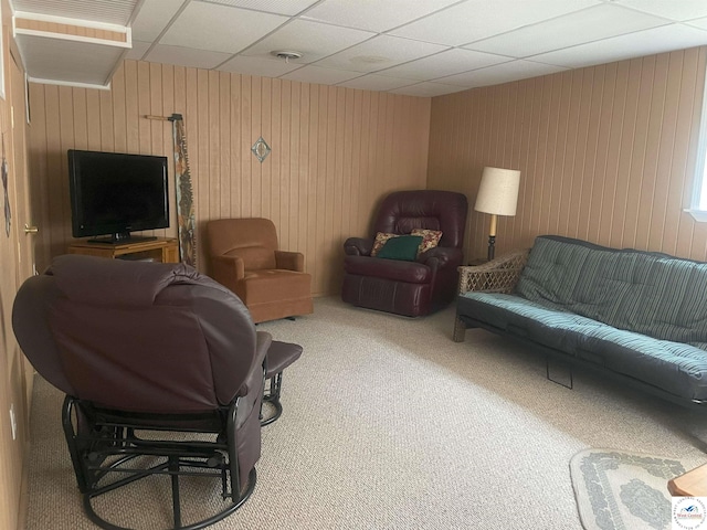 791 SE 1211th Rd, Deepwater, MO 64740 - carpeted living room featuring wooden walls and a drop ceiling