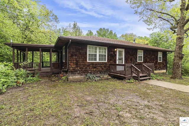view of front facade with a deck