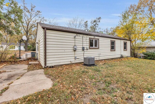 6204 E 147th Ter, Grandview, MO 64030 - back of property with cooling unit