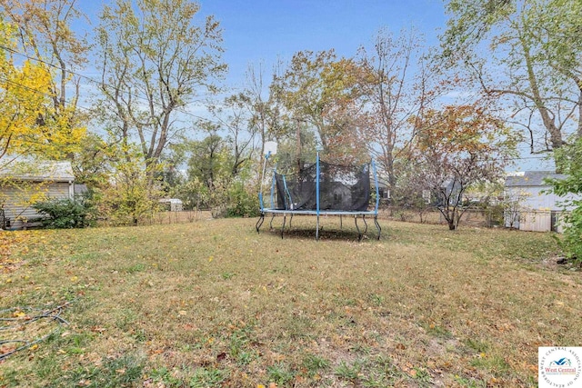 6204 E 147th Ter, Grandview, MO 64030 - view of yard with a trampoline