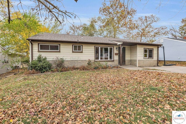 6204 E 147th Ter, Grandview, MO 64030 - single story home featuring a front lawn