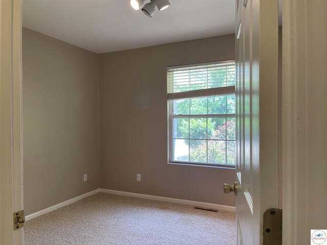 845 Ww Hwy, Osceola, MO 64776 - carpeted empty room with baseboards