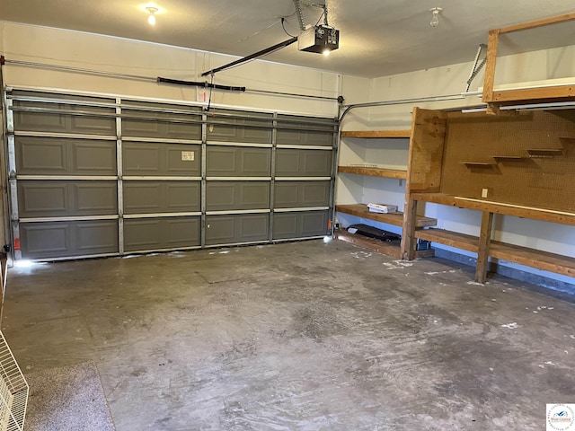 845 Ww Hwy, Osceola, MO 64776 - garage featuring a garage door opener