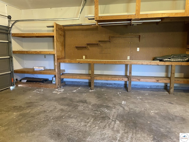 845 Ww Hwy, Osceola, MO 64776 - garage featuring a workshop area