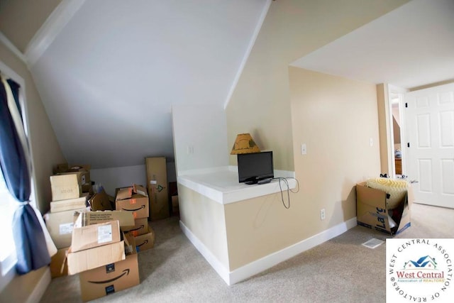 1625 W 16th St, Sedalia, MO 65301 - bonus room featuring carpet flooring, vaulted ceiling, and baseboards