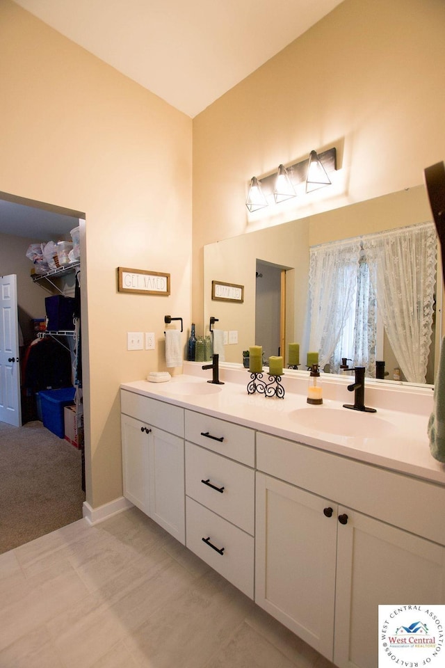 1625 W 16th St, Sedalia, MO 65301 - bathroom featuring double vanity