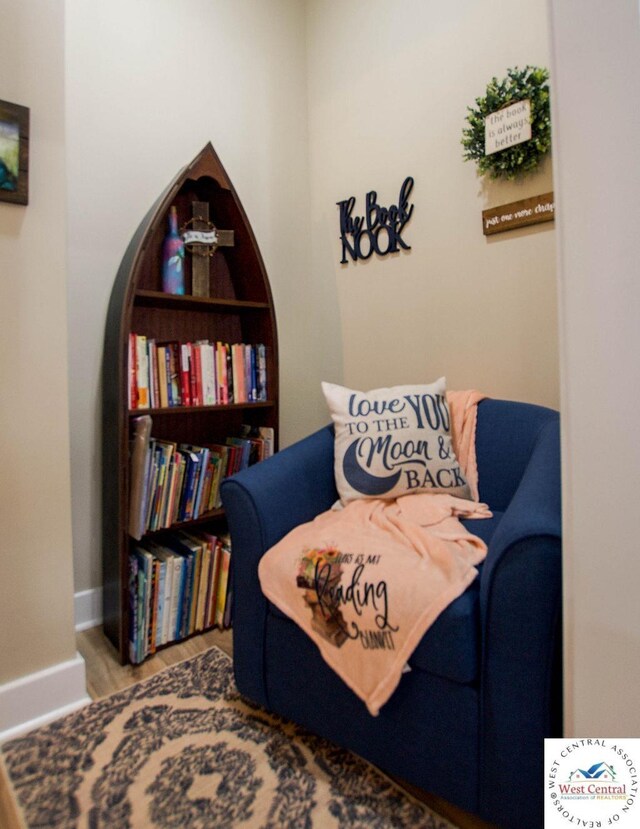 1625 W 16th St, Sedalia, MO 65301 - living area featuring wood finished floors and baseboards