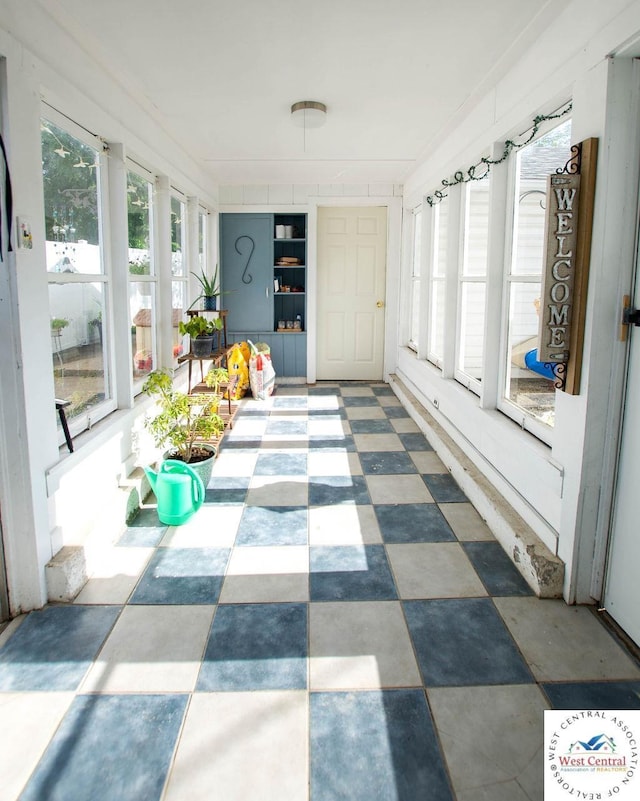 1625 W 16th St, Sedalia, MO 65301 - view of unfurnished sunroom