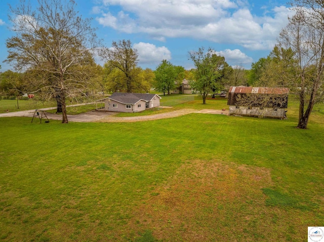 216 S County Line Rd, Windsor, MO 65360 - view of green lawn featuring an outdoor structure