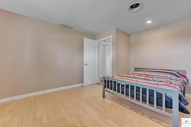 216 S County Line Rd, Windsor, MO 65360 - bedroom with wood finished floors and baseboards