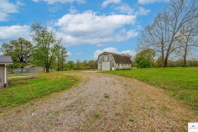 216 S County Line Rd, Windsor, MO 65360 - view of dirt / gravel road featuring a barn