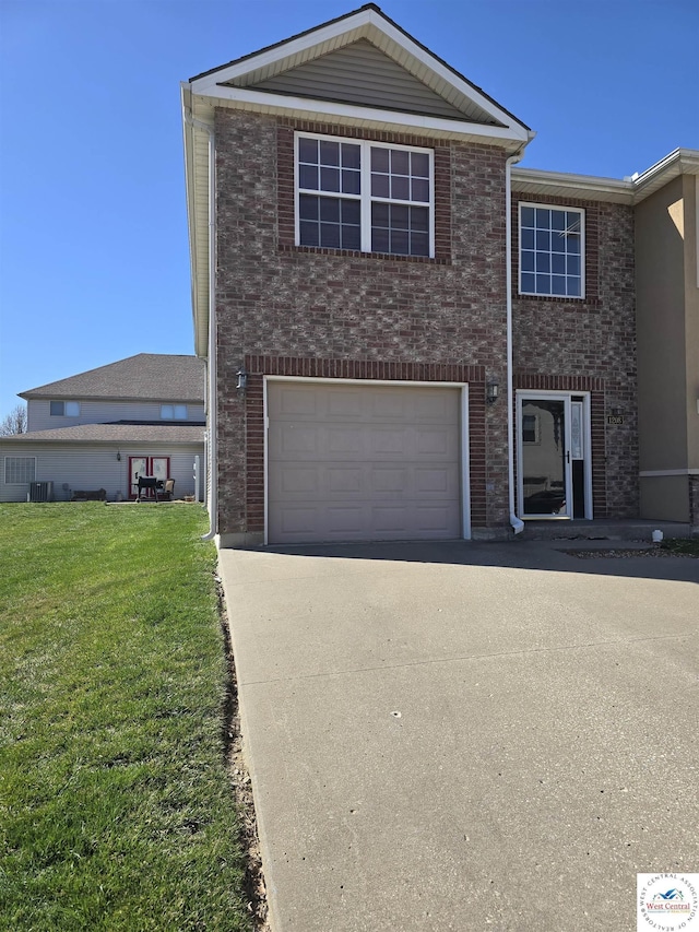 view of front of home featuring an attached garage, concrete driveway, a front yard, and brick siding