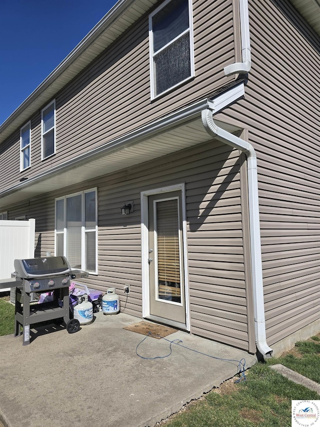 exterior space featuring a patio and fence