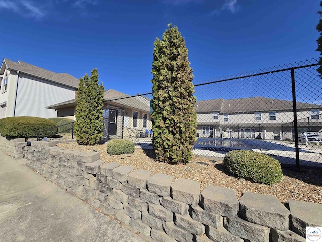 view of front of home with fence