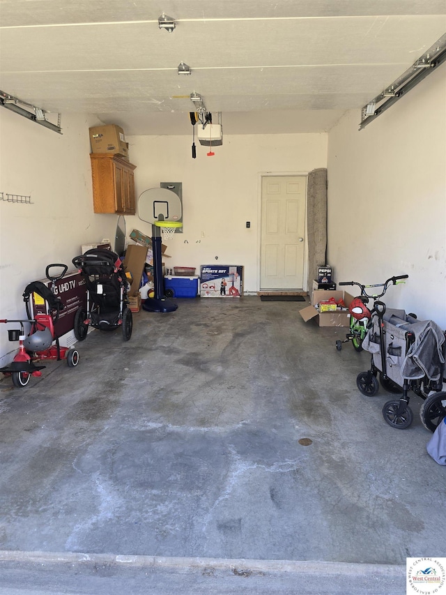 garage featuring a garage door opener