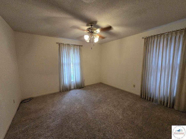 unfurnished room with a textured ceiling, ceiling fan, and carpet flooring