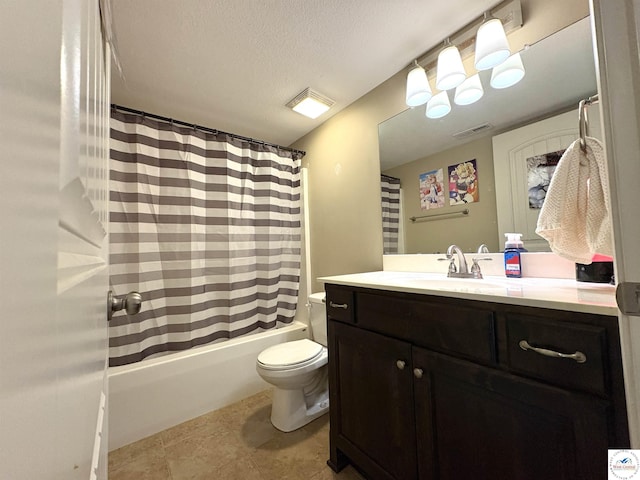 full bathroom featuring toilet, vanity, shower / tub combo with curtain, and a textured ceiling