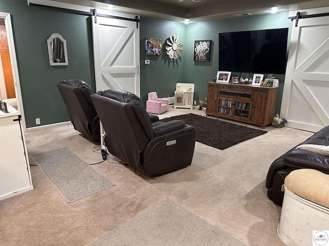 34443 Peters Ave, Warsaw, MO 65355 - carpeted home theater featuring a barn door and baseboards