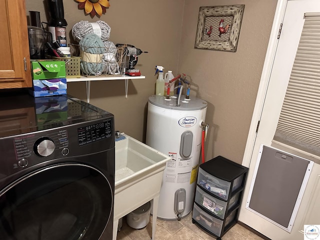 34443 Peters Ave, Warsaw, MO 65355 - laundry area with electric water heater, cabinet space, and washer / clothes dryer