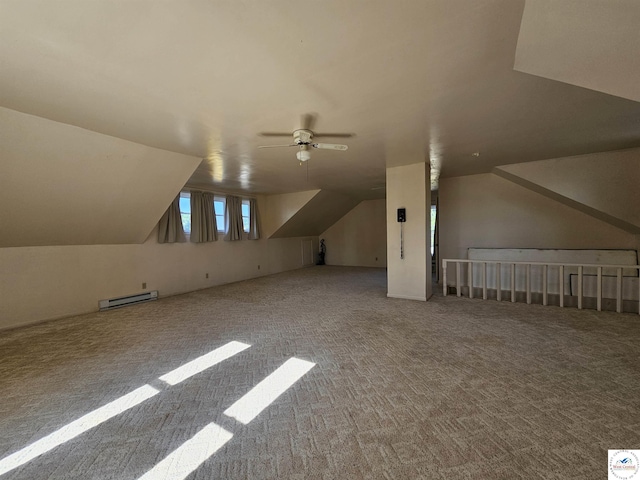 406 W Main St, Cole Camp, MO 65325 - bonus room with a baseboard radiator, carpet flooring, a ceiling fan, and vaulted ceiling
