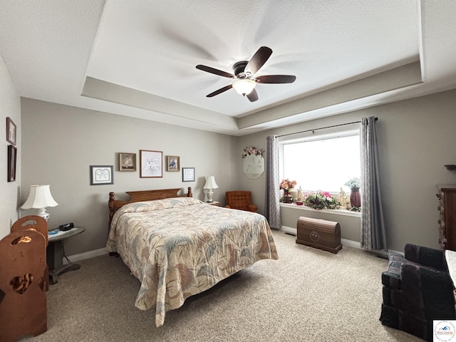 711 Katy Cir, Sedalia, MO 65301 - bedroom with a raised ceiling, light colored carpet, baseboards, and ceiling fan