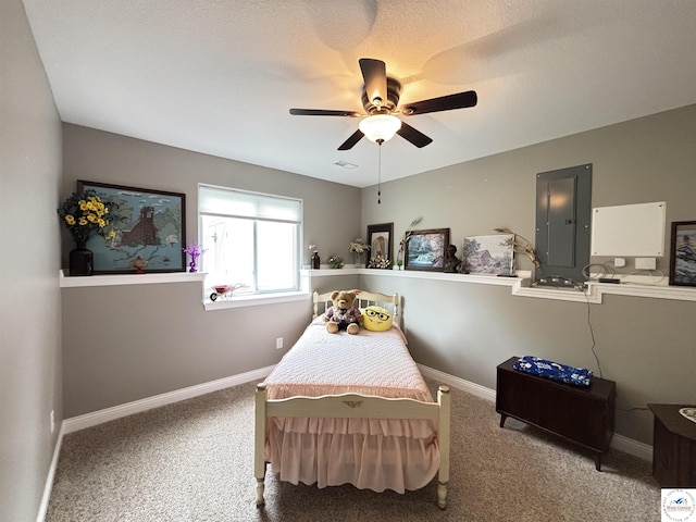 711 Katy Cir, Sedalia, MO 65301 - carpeted bedroom with electric panel, baseboards, and ceiling fan