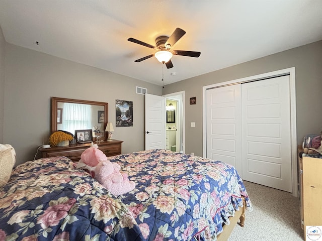 711 Katy Cir, Sedalia, MO 65301 - carpeted bedroom featuring a closet and a ceiling fan
