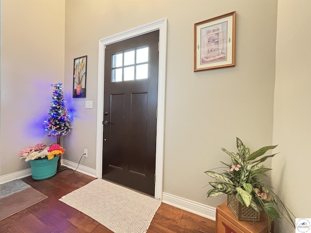 711 Katy Cir, Sedalia, MO 65301 - foyer featuring baseboards and wood finished floors