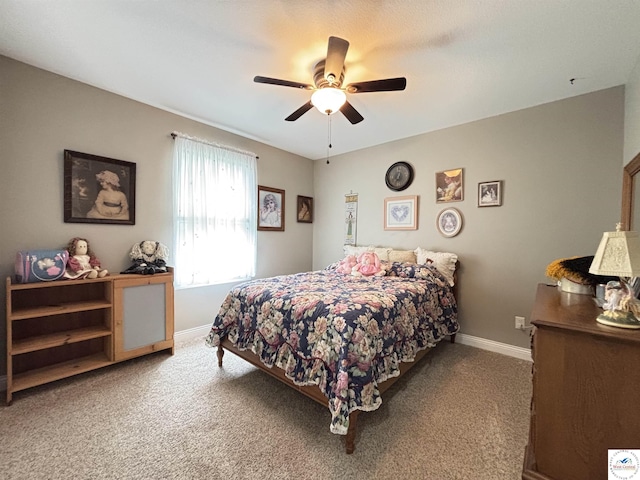 711 Katy Cir, Sedalia, MO 65301 - bedroom featuring carpet floors, baseboards, and ceiling fan