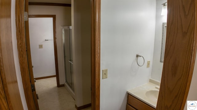 1679 Sunchase Dr, Warsaw, MO 65355 - bathroom featuring vanity, baseboards, and a shower stall