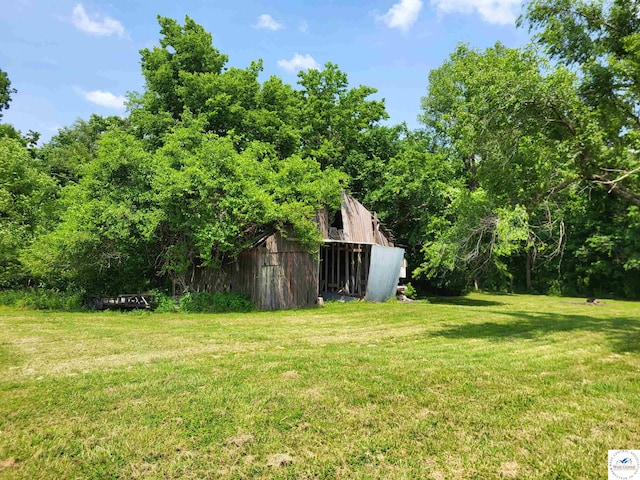 81 SE 500th Rd, Clinton, MO 64735 - view of green lawn featuring an outbuilding and a pole building