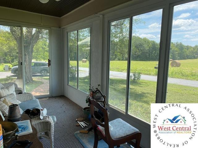 81 SE 500th Rd, Clinton, MO 64735 - sunroom / solarium featuring plenty of natural light and a ceiling fan
