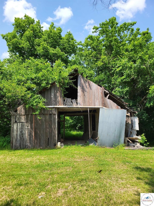 81 SE 500th Rd, Clinton, MO 64735 - view of green lawn with an outbuilding