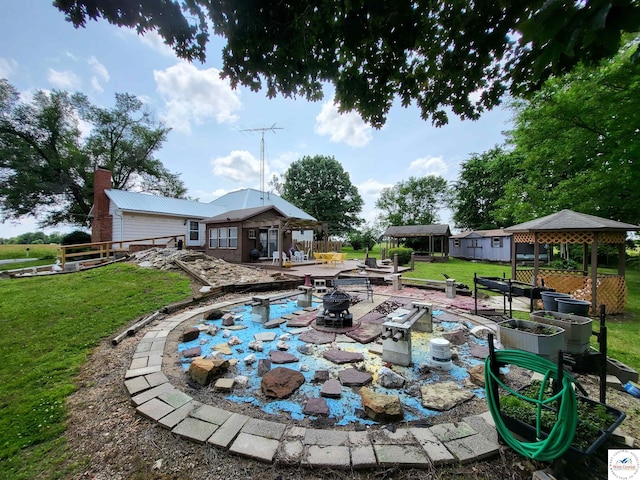 81 SE 500th Rd, Clinton, MO 64735 - view of swimming pool with an outdoor fire pit, a gazebo, and a patio area