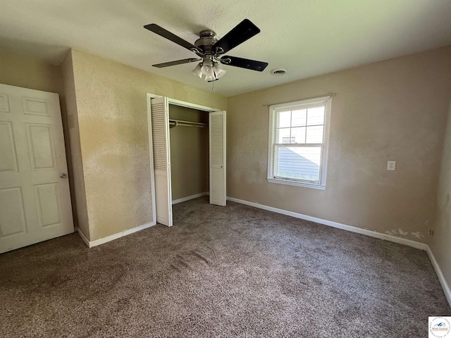 109 E Fairview St, Clinton, MO 64735 - unfurnished bedroom featuring carpet floors, a closet, and a ceiling fan
