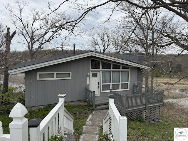 31450 Stonecrest Rd, Warsaw, MO 65355 - view of front of house with a deck and a shingled roof