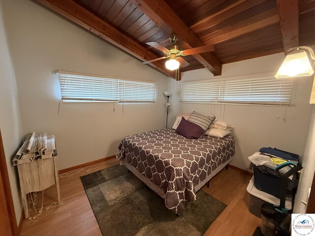 31450 Stonecrest Rd, Warsaw, MO 65355 - bedroom with ceiling fan, lofted ceiling with beams, baseboards, wooden ceiling, and wood finished floors